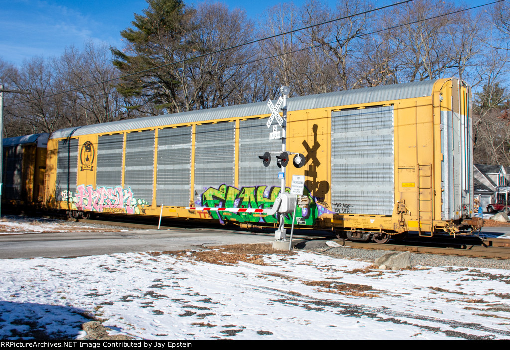 A CPKC autorack rolls across Snake Hill Road